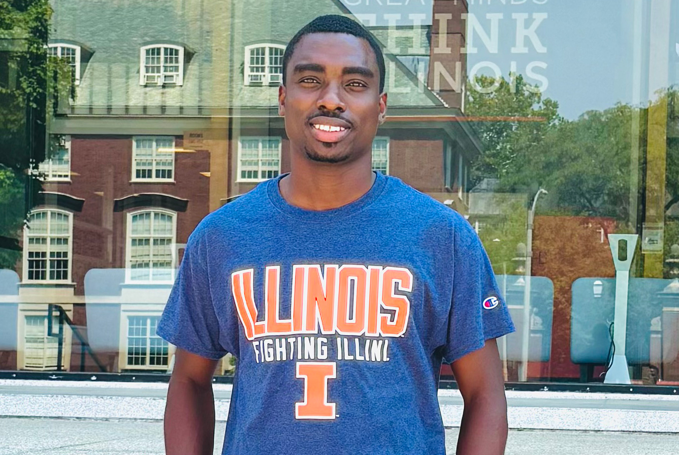 headshot of Samuel Kumi in front of the College of Education building smiling