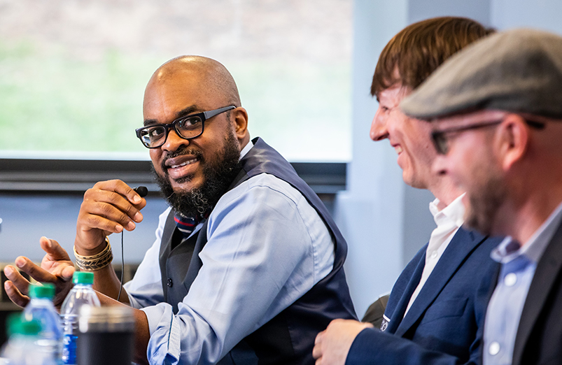 Image of professors laughing