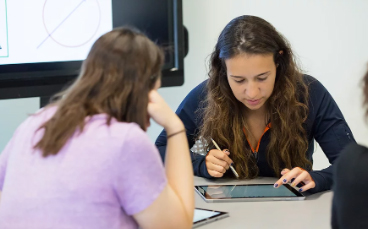 Image of students studying on tablets