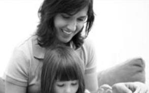 Image of mother and daughter reading