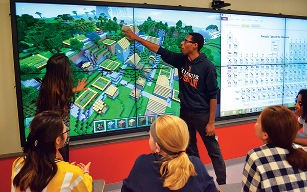 Image of student using an interactive board